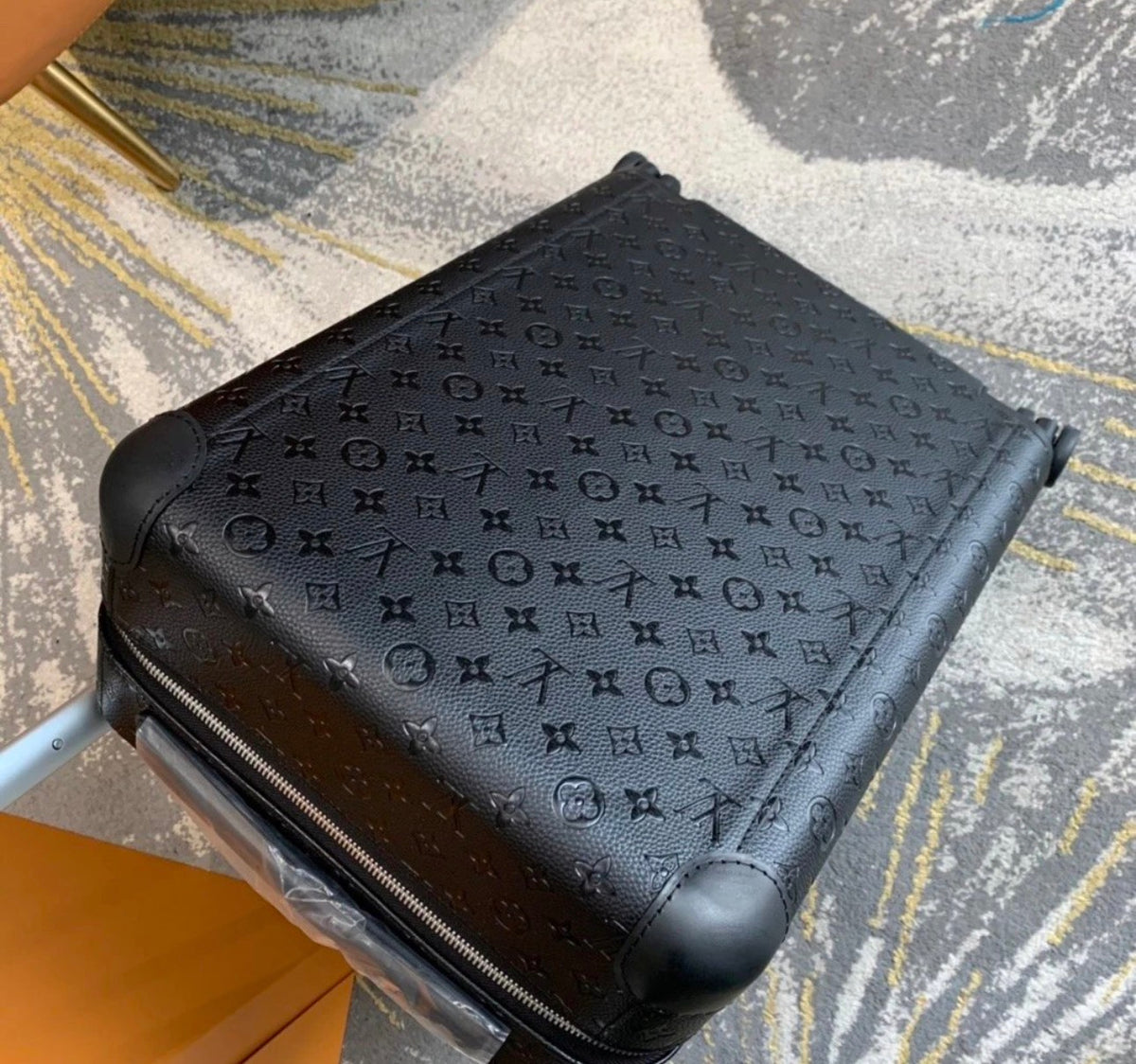 Louis Vuitton Trolly.